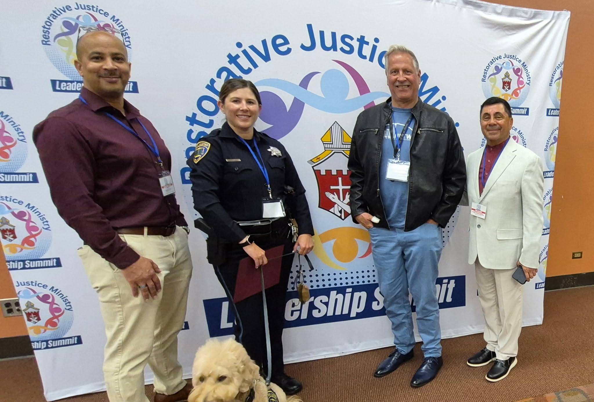 The founder with attendees at the Restorative Justice Ministry Leadership Summit