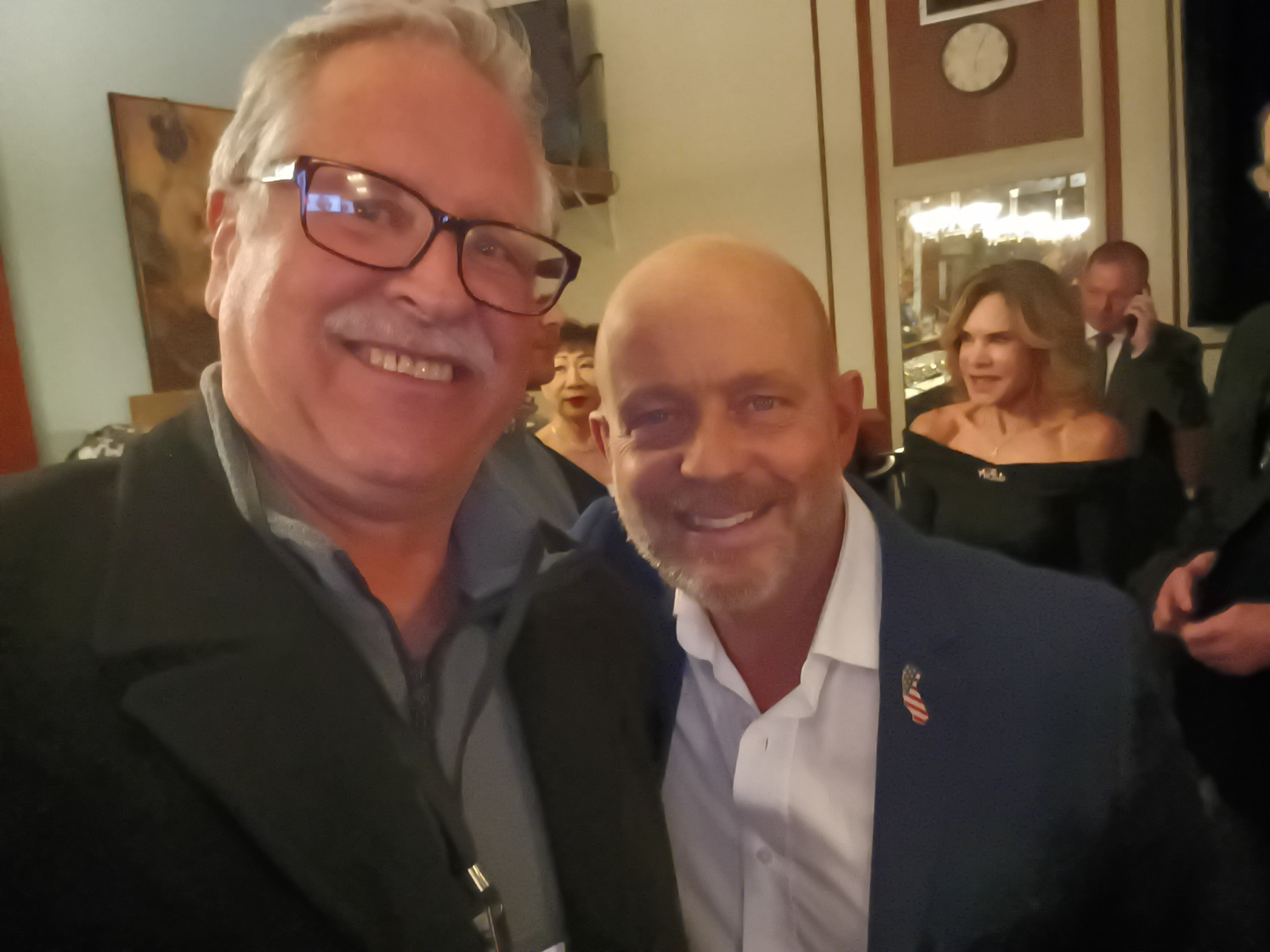 The founder of The Revive Project with Steve Hilton at a community reception