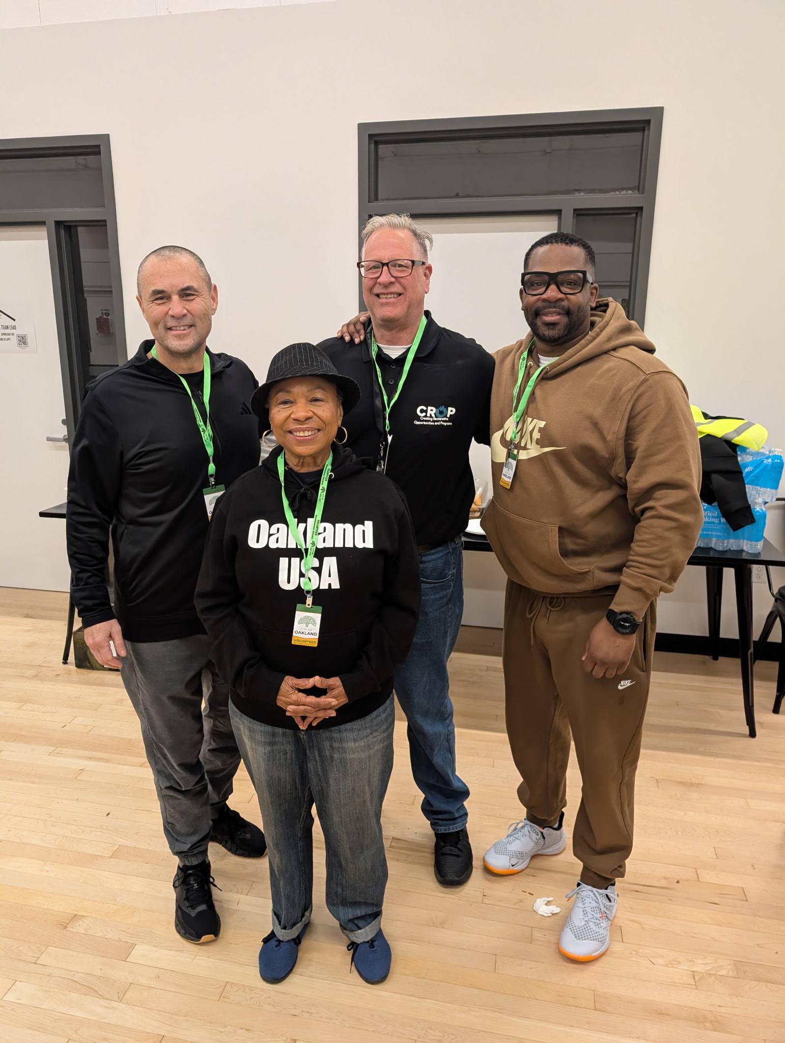 The founder with fellow volunteers at a community service event in Oakland