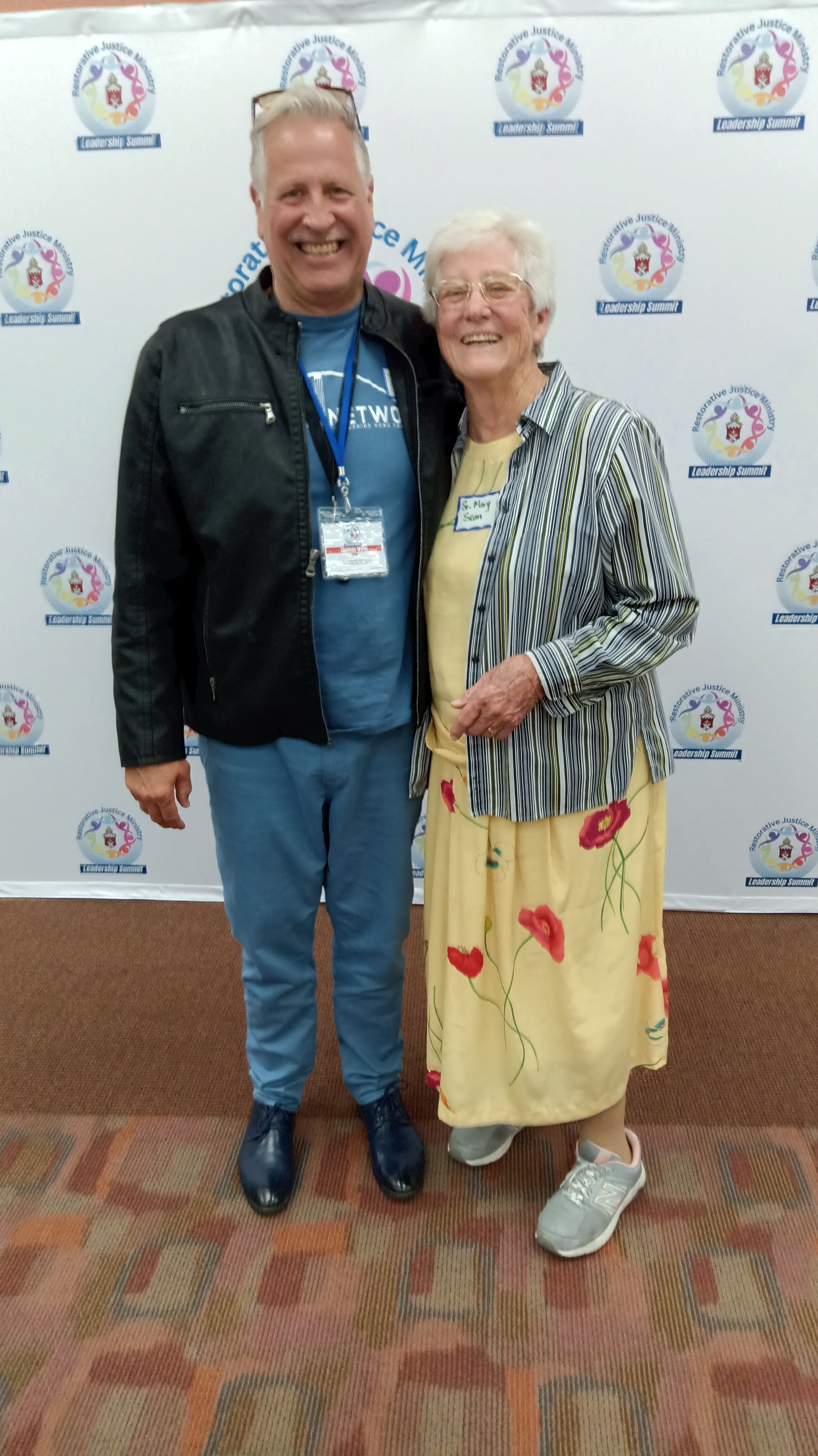 The founder with a longtime prison ministry volunteer at the Restorative Justice Ministry Leadership Summit